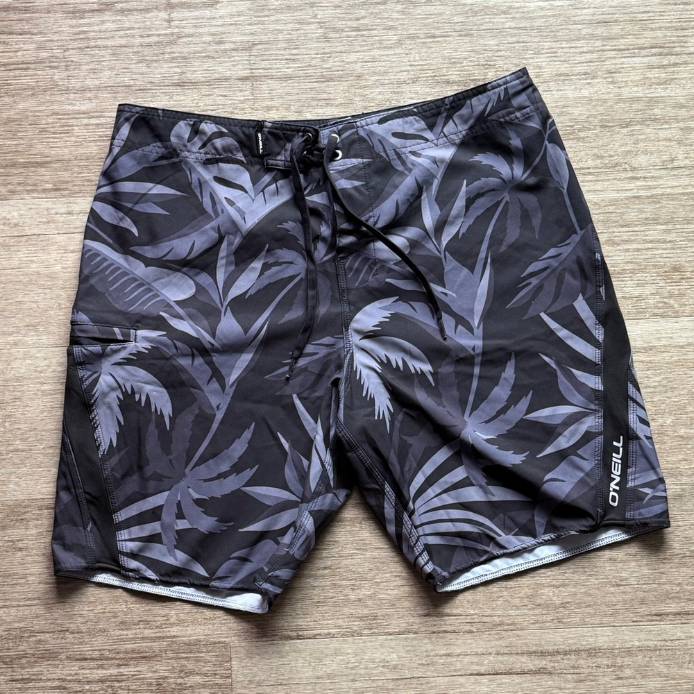 O'Neill Black and Gray Board Shorts with Tropical Pattern